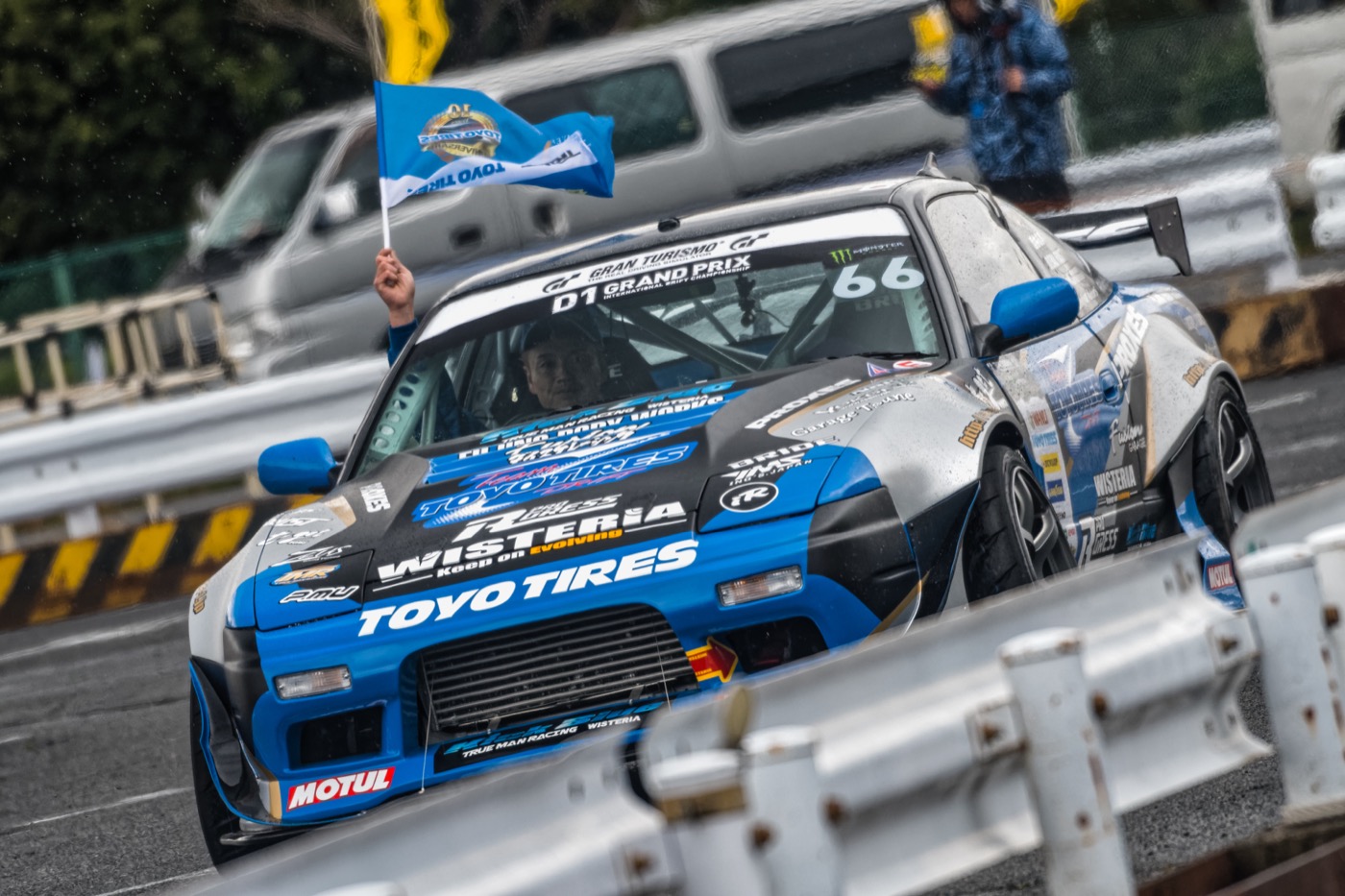 Hideyuki Fujino sliding his #66 Team Toyo Tires Drift Toyota GR86 in D1 Grand Prix competition