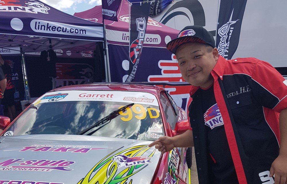 Naoki Nakamura drifting the Team Toyo Tires Drift Nissan S15 at Drift Masters Japan